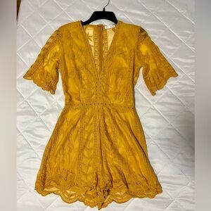 Stunning ochre yellow lace romper